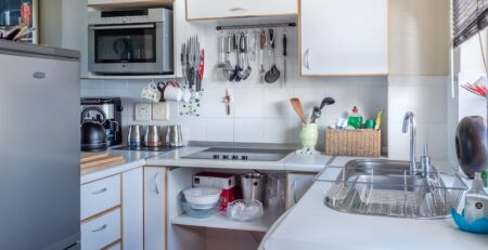 Cozy modern kitchen interior with appliances.